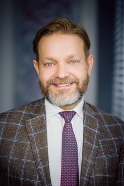 Piotr Augustyniak, Founding Partner logo